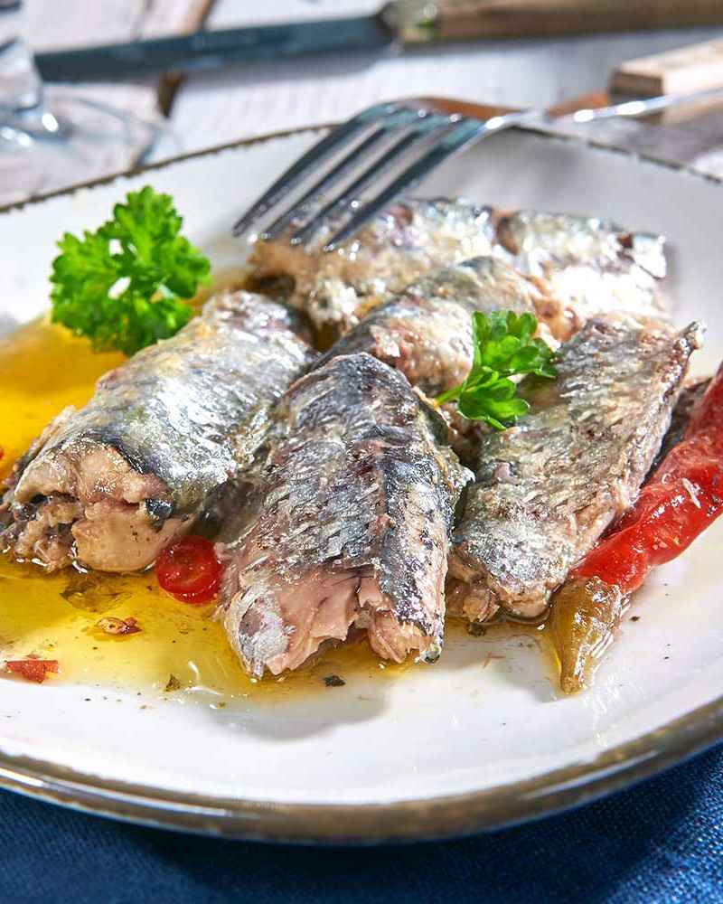 Filets de sardines piquants dans huile d'olive Pikante Sardinenfilets in Olivenöl